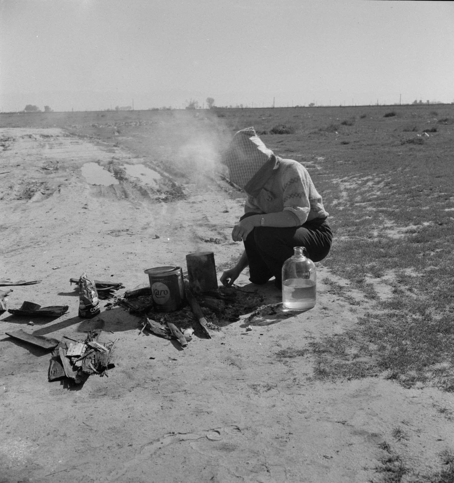#15 Along a California highway, a dust bowl refugee bound for Oregon, 1934
