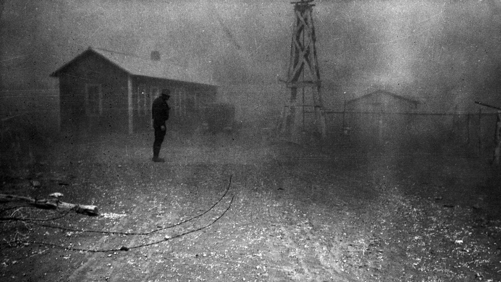 #41 A dust storm. Conditions like these forced many farmers to abandon the area. New Mexico, 1930s