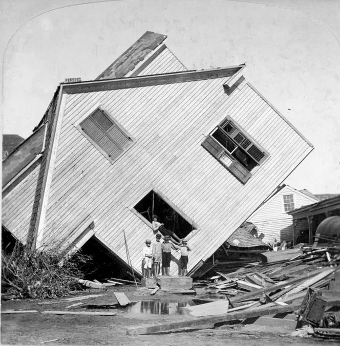 #34 A house on Avenue N lies on its side following the Hurricane in Galveston.