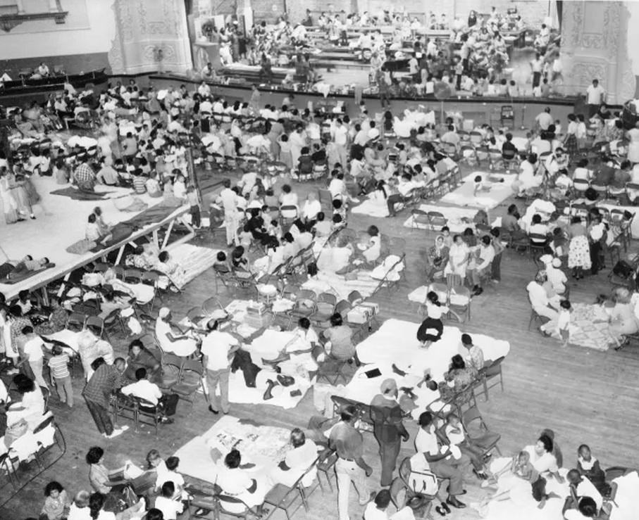 #36 Thousands of Houstonians left homeless by Carla took shelter in school auditoriums across the city.