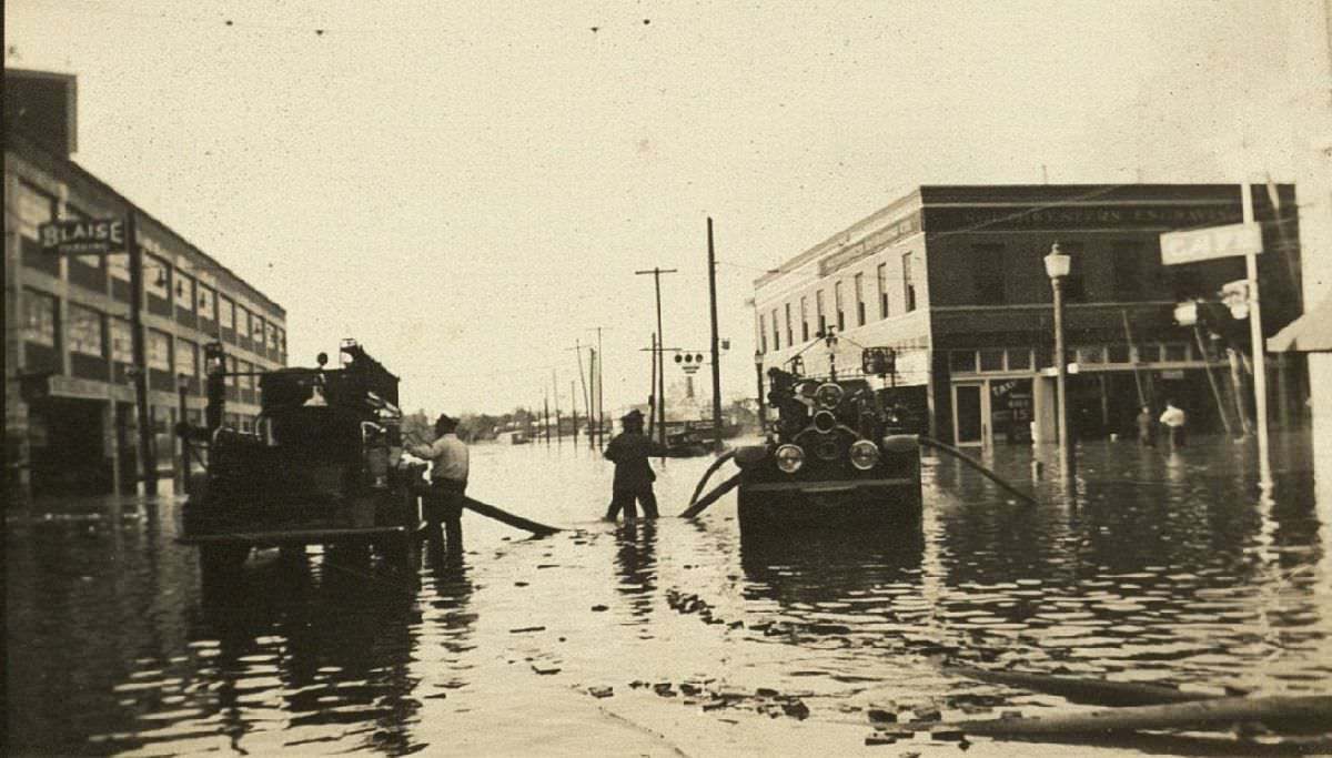 #7 Firefighters on flooded street, 1935