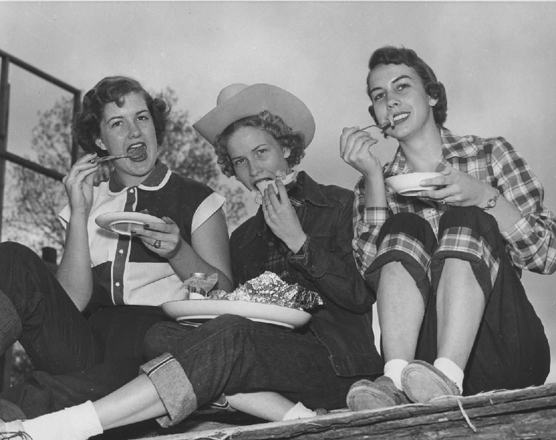 #10 Three students eating, 1953