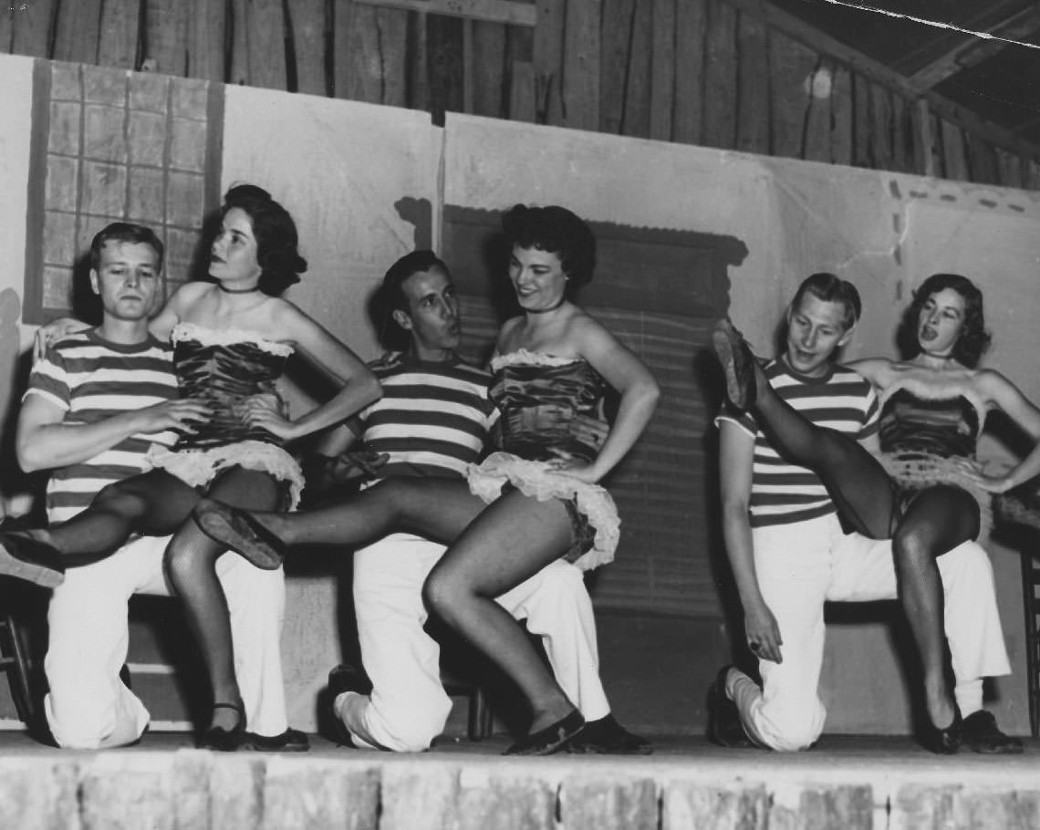 #16 Students perform can-can on stage, 1950s