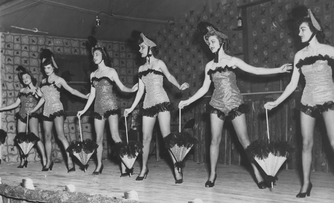 #33 Performers dancing with parasols, 1950s