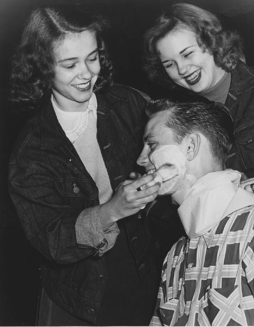 #38 Student shaves another student’s beard, 1950s