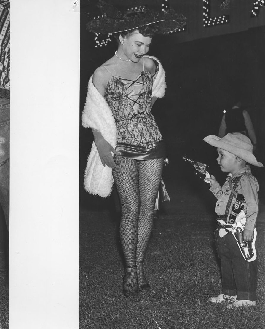 #40 Performer with small boy, 1950s
