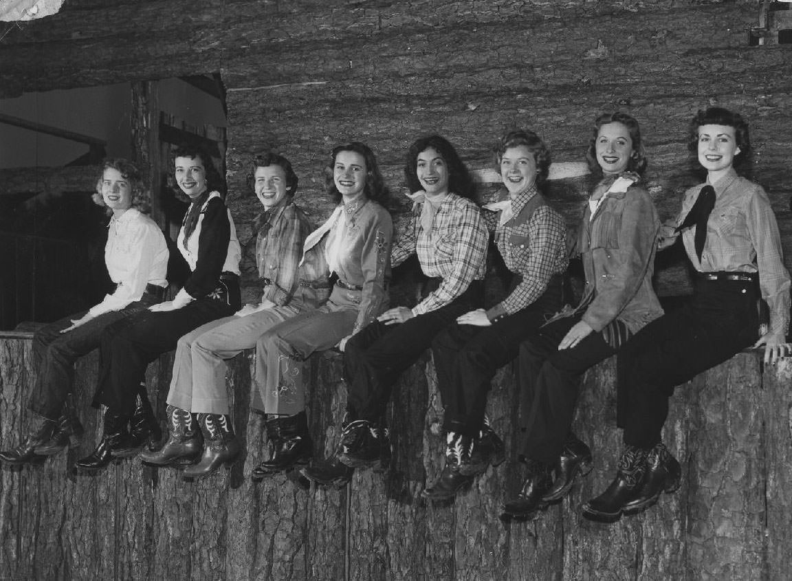#42 Students sit on a wooden ledge, 1950s