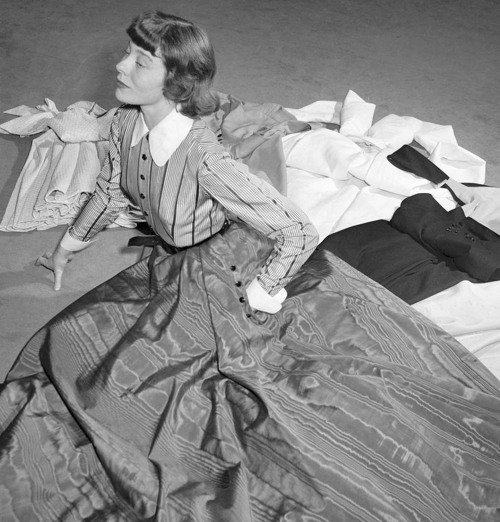 #102 Model Bettina Graziani shows one of the eleven Jacques Fath dresses chosen as a trousseau by screen star Rita Hayworth.