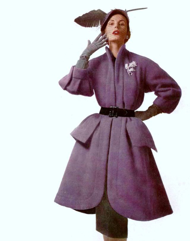 #10 Jackie Stoloff in purple woolen coat, belted over gray skirt by Jacques Fath, photo by Philippe Pottier, 1951