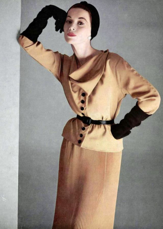 #17 Joan Whelan in two-piece silk crepe dress with finely pleated skirt by Jacques Fath,photo by Pottier, 1952