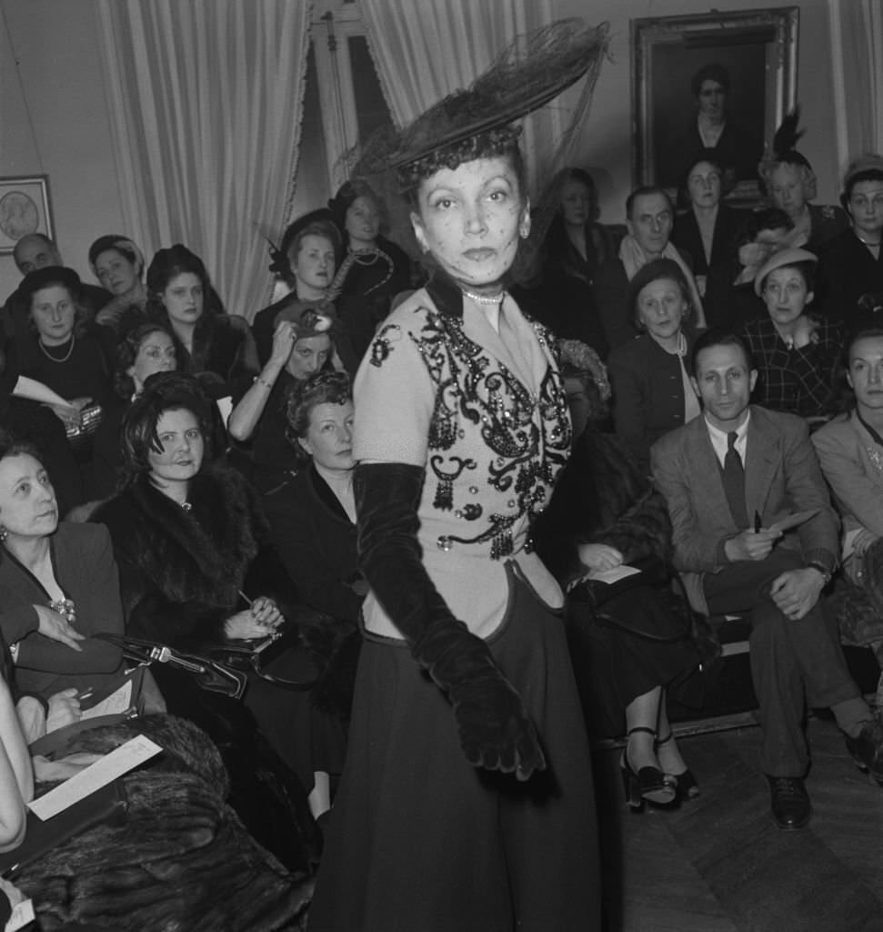 #49 A fashion show for the Jacques Fath spring collection in Paris, France, February 1948.