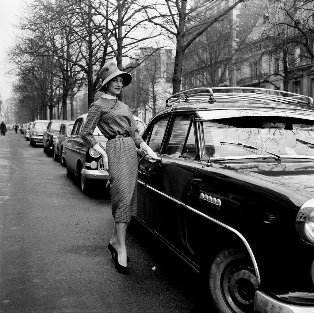 #66 Model wearing a Jacques Fath model in 1957.