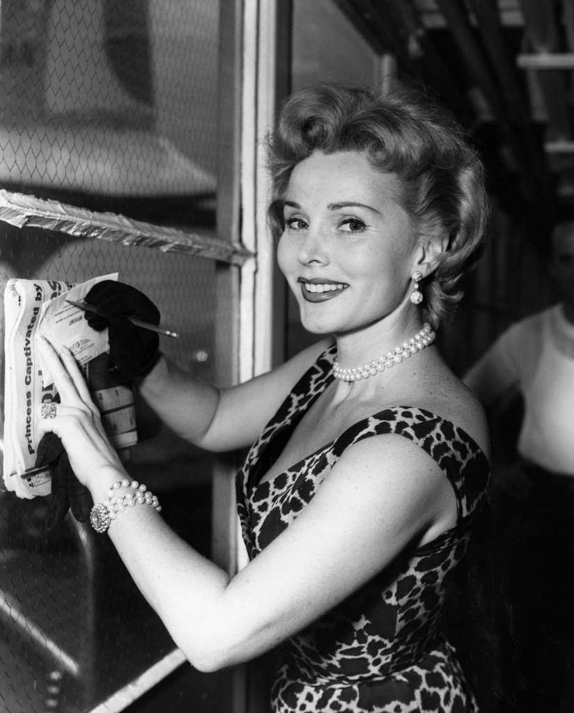 #85 Zsa Zsa Gabor wearing a Jacques Fath outfit n grey and black silk, designed for the film ‘Public Enemy Number 1’, 1953