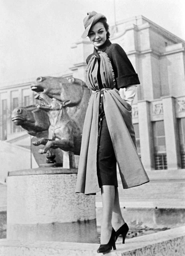 #90 Afashion model wearing a clothing created by Jacques Fath.