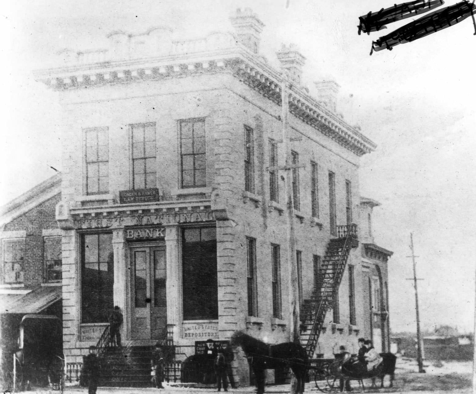 #14 The First National Bank at the corner of River and Milwaukee Streets, 1890s.