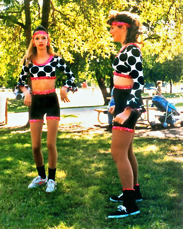 #45 Two girls chat before a dance performance, Keller, 1995