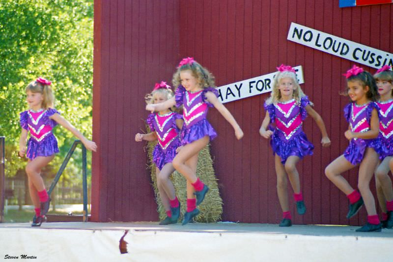 #46 Young girls from a dance school perform, Keller, 1995