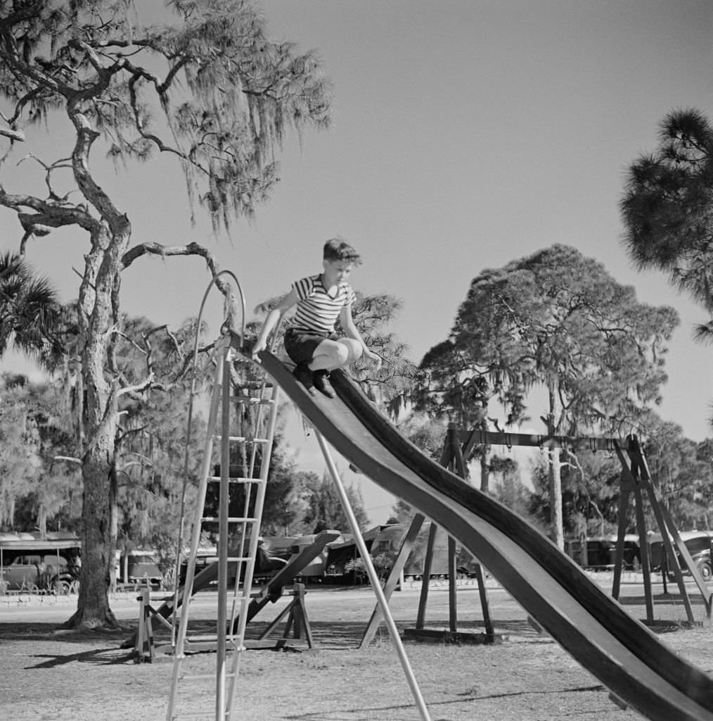 #106 Boy on Playground Slide, Sarasota Trailer Park, Sarasota, Florida, January 1941