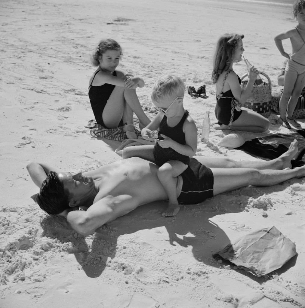 #115 Family Enjoying Sun and Beach, Sarasota, Florida, January 1941