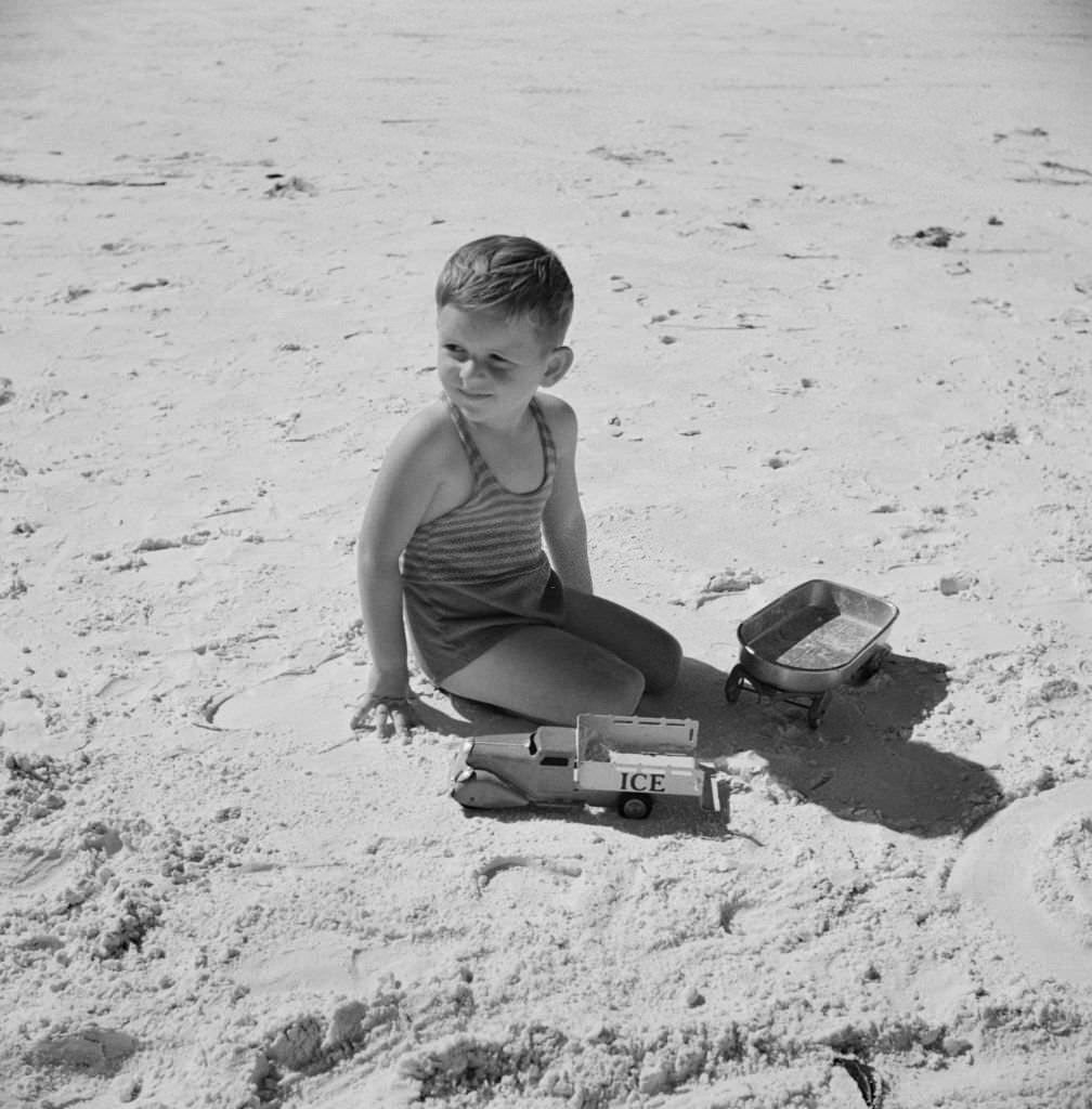 #117 Young Boy Playing on Beach, Sarasota, Florida, January 1941
