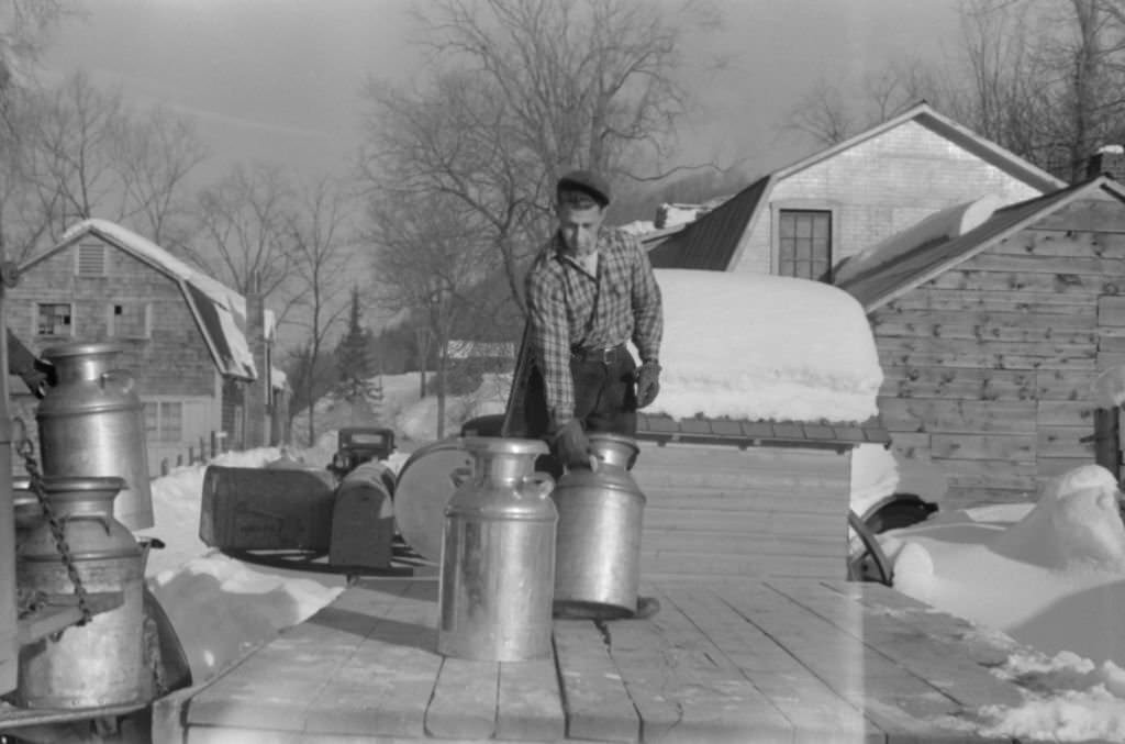 #144 Farmer Bringing Cans of Milk to Crossroads Early in Morning Vermont, March 1940