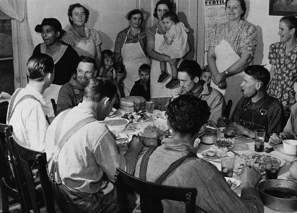 #163 Members of the Wilkins family at home near Stem, North Carolina, enjoying a family meal, November 1939