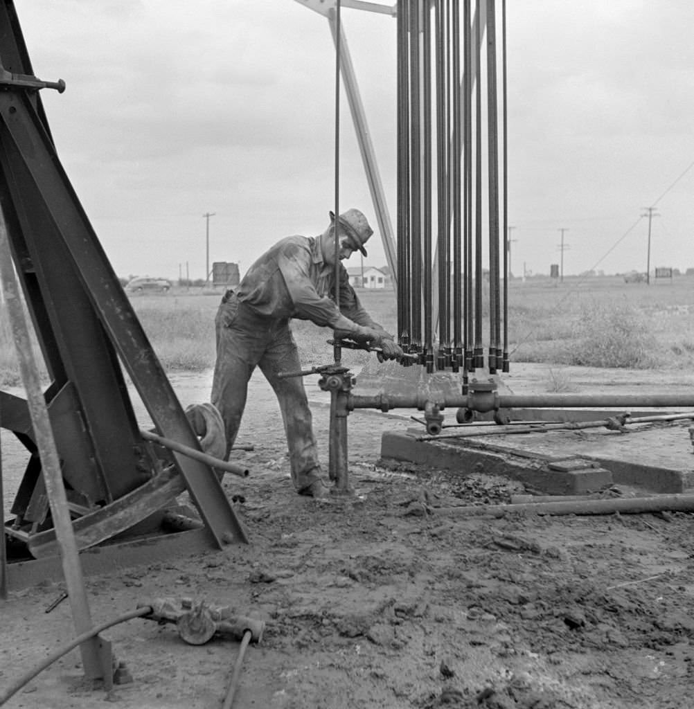 #171 Man Servicing Old Oil Well, near Wichita, Kansas, September 1941