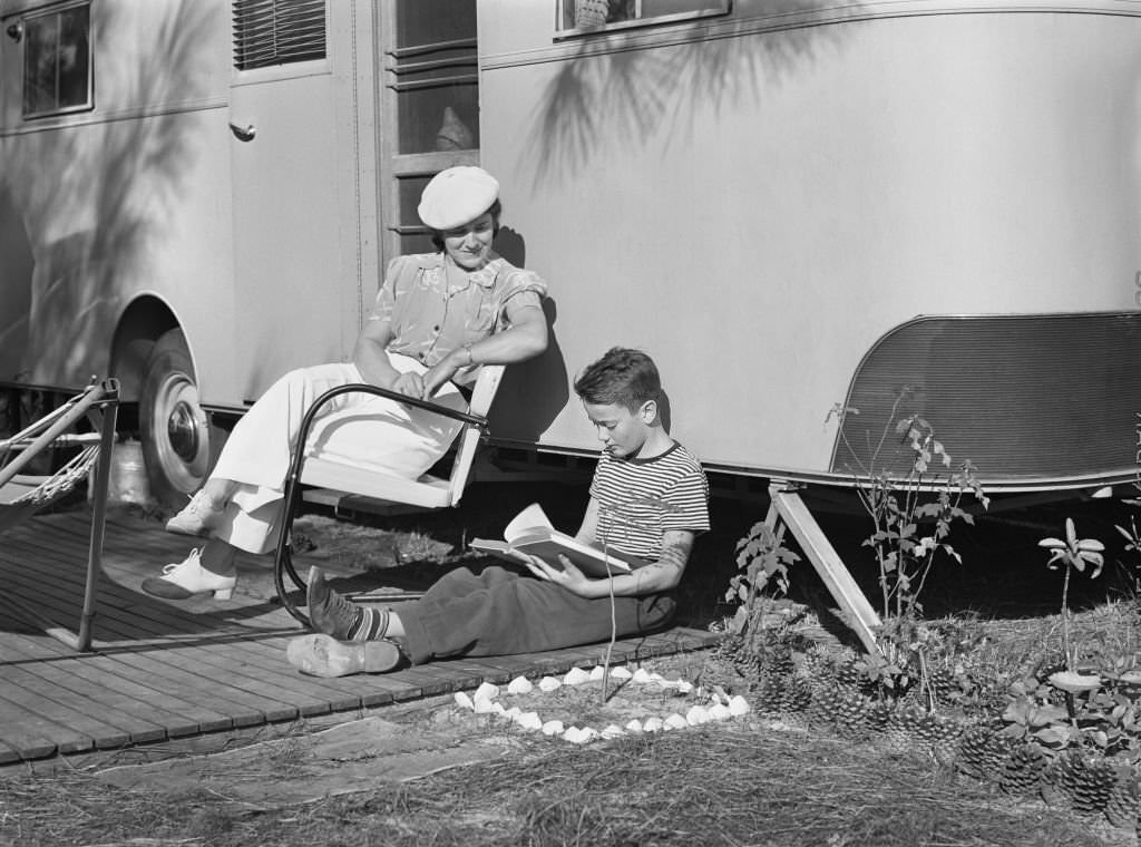 #200 Mother listening to son read. Sarasota trailer park, Sarasota, Florida, January, 1941