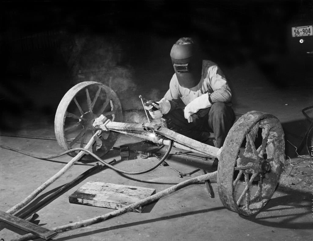 #215 Mechanic welding Axle, Atlanta, Georgia, 1939