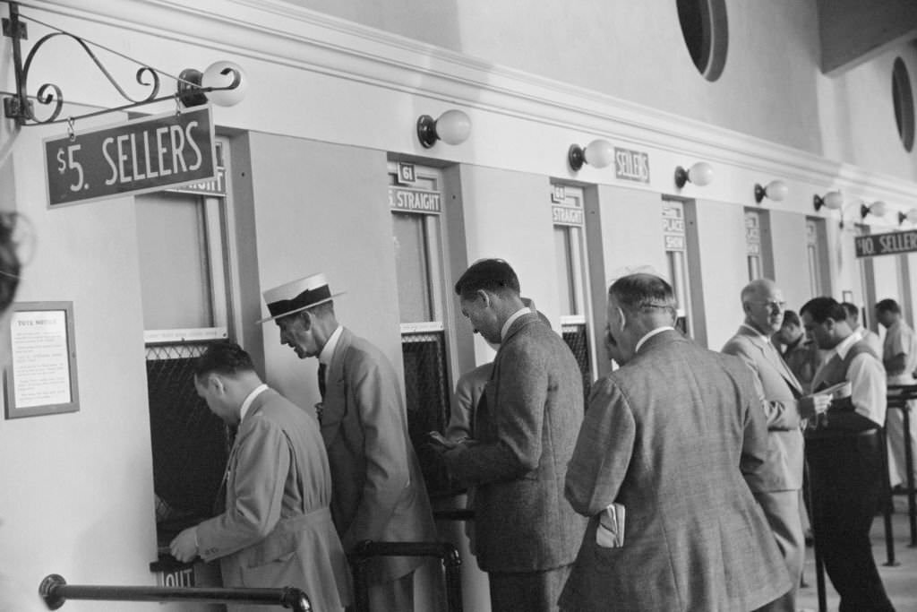 #4 Group of Men Waging Bets on Horse Race at Betting Windows, Hialeah Park, Miami, Florida, 1939