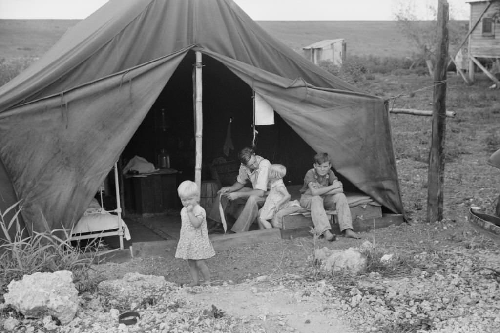 #54 Family of Migrant Worker Living in Tent, near Canal Point Packinghouse, Florida, 1939