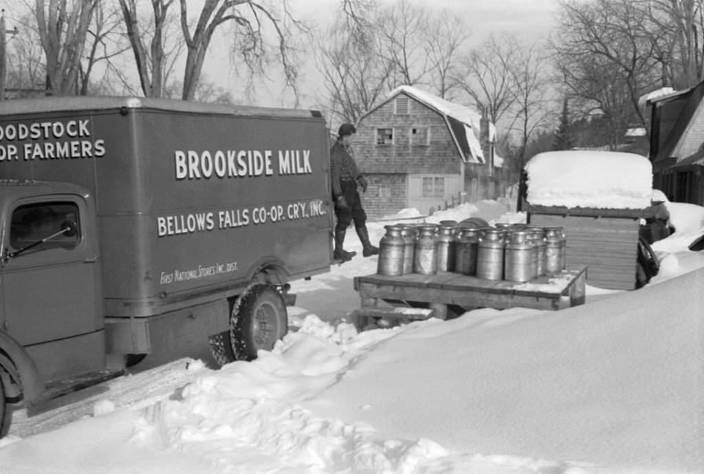 #56 Farmers bring their cans of milk to the crossroads early every morning where it is picked up by the Bellows Falls Co-op Creamery truck and is taken to Brookside Milk Company in town, Woodstock, Vermont, 1939.