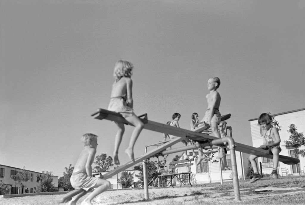 #64 Children on Seesaw at Playground, Greenbelt, Maryland, 1939