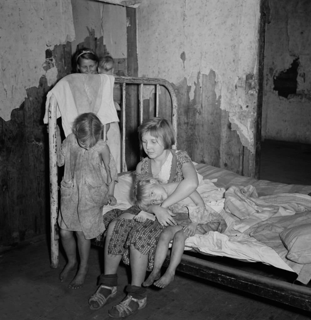 #67 Coal Miner’s Children in Bedroom, Pursglove, West Virginia, 1939