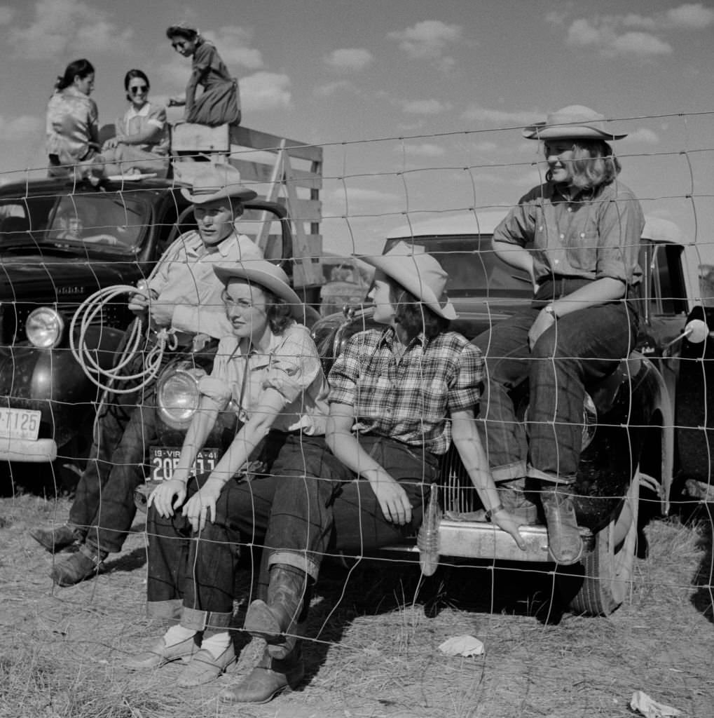 #96 Group of People from Local Ranch watching Crow Fair, Crow Agency, Montana, July 1941