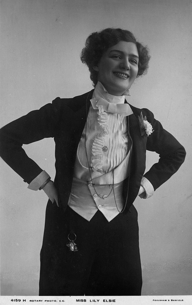 #22 Musical stage actress Lily Elsie, dressed in men’s formal clothing, 1910
