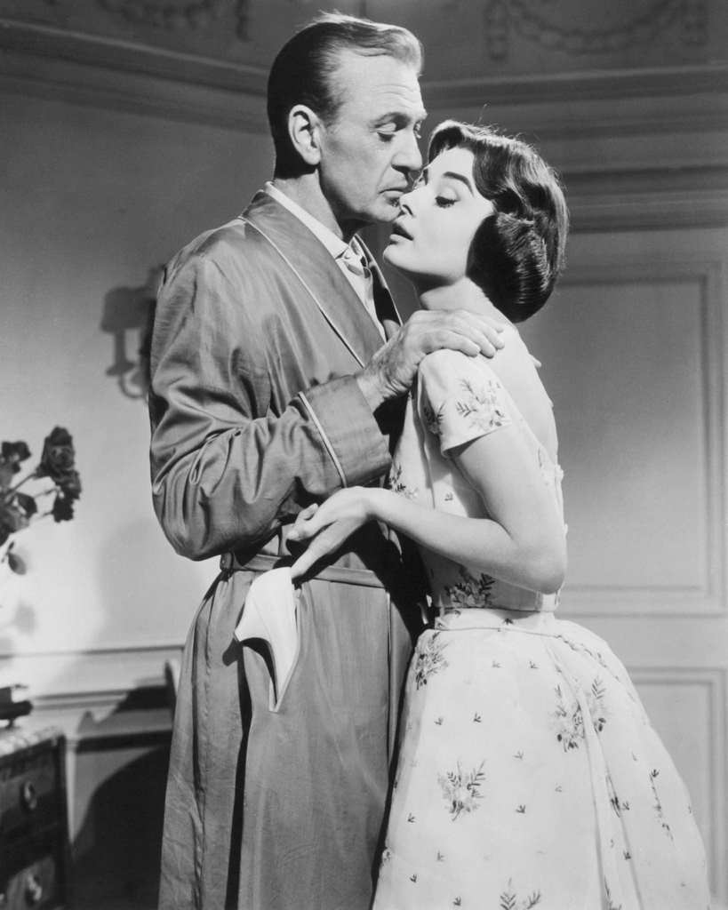 Gary Cooper as Frank Flannagan, and Audrey Hepburn as Ariane Chavasse, in a publicity still for ‘Love In The Afternoon’, 1957.