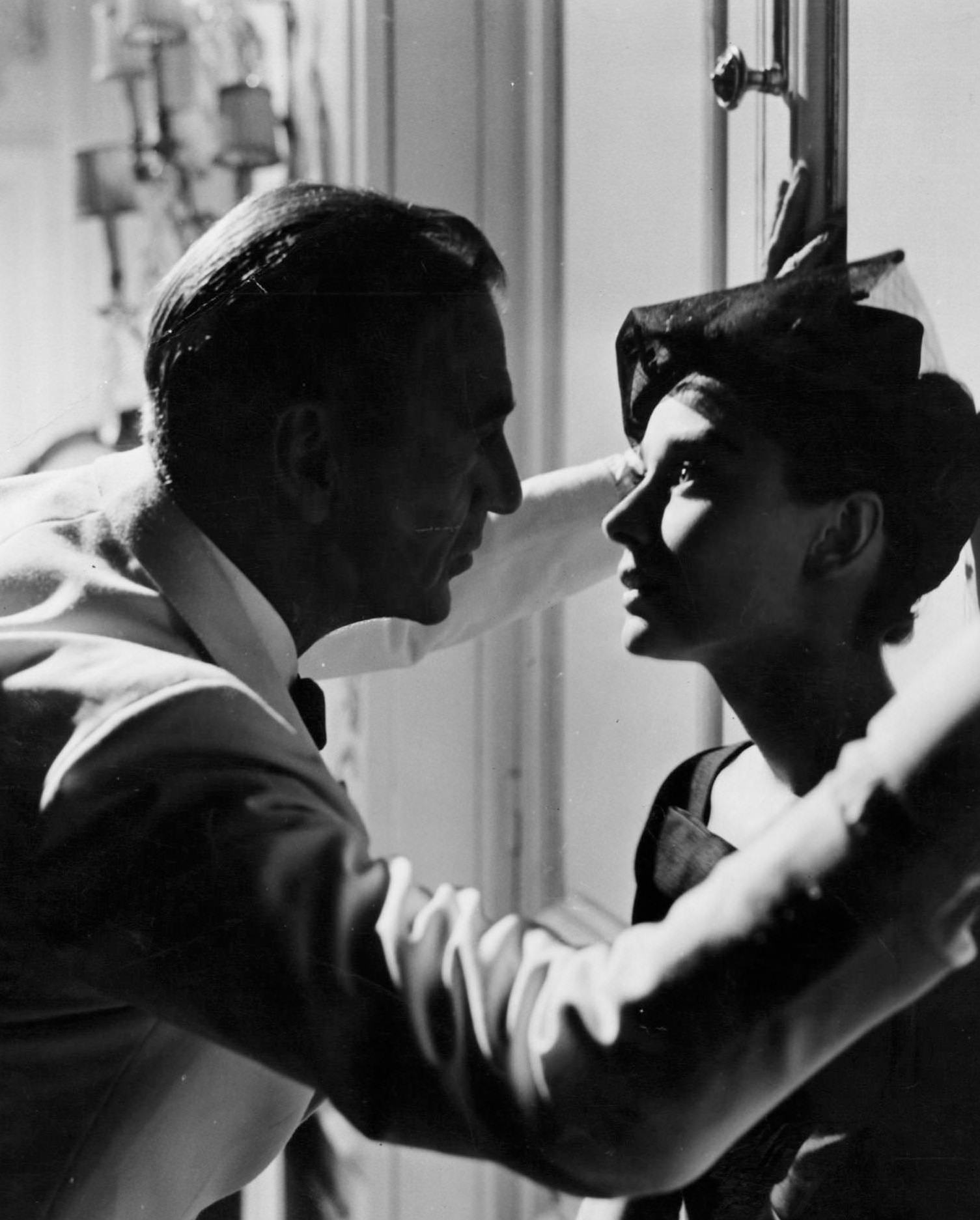 Gary Cooper faces Audrey Hepburn in a scene from the film ‘Love In The Afternoon’, 1957.