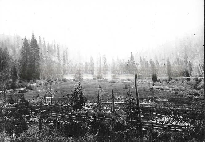 #9 Early day mining camp as seen from a distance in its mountain setting, 1855