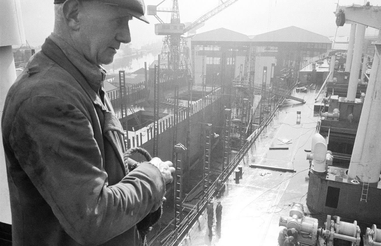 #44 A worker at a shipyard in Greenock on the Clyde, Scotland, 1963.
