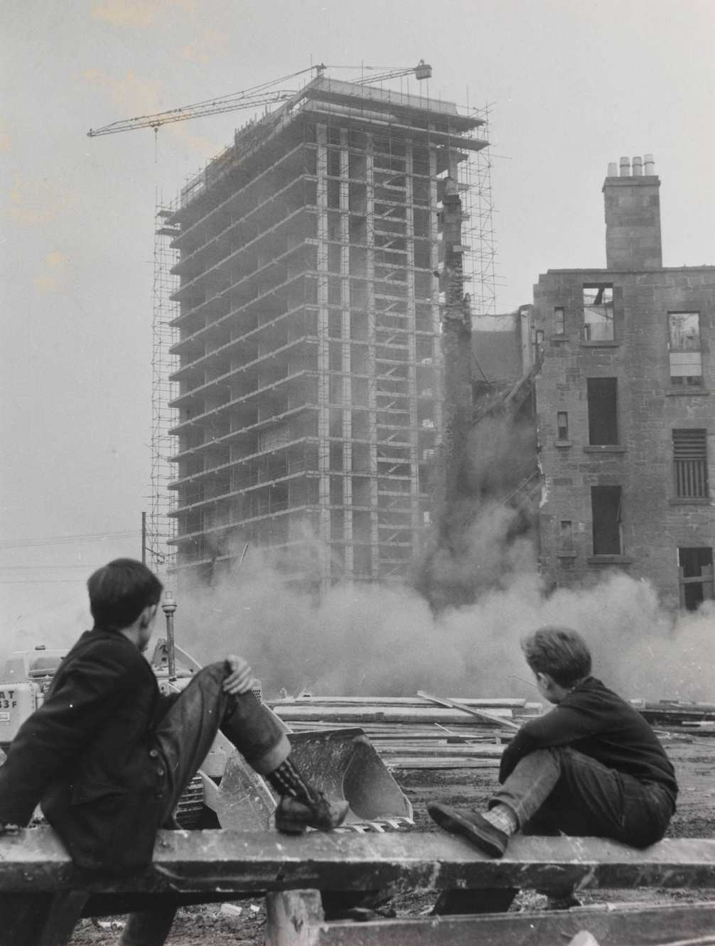 #56 Down Comes the Old One as the New One Looms Up, 1962.