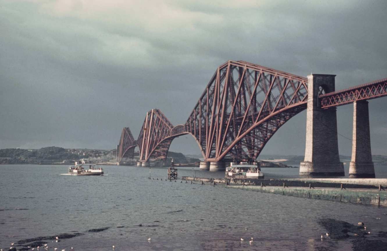 #67 View looking north from South Queensferry of the Forth Bridge, a cantilever railway bridge crossing the Firth of Forth, near Edinburgh in Scotland, 1960.