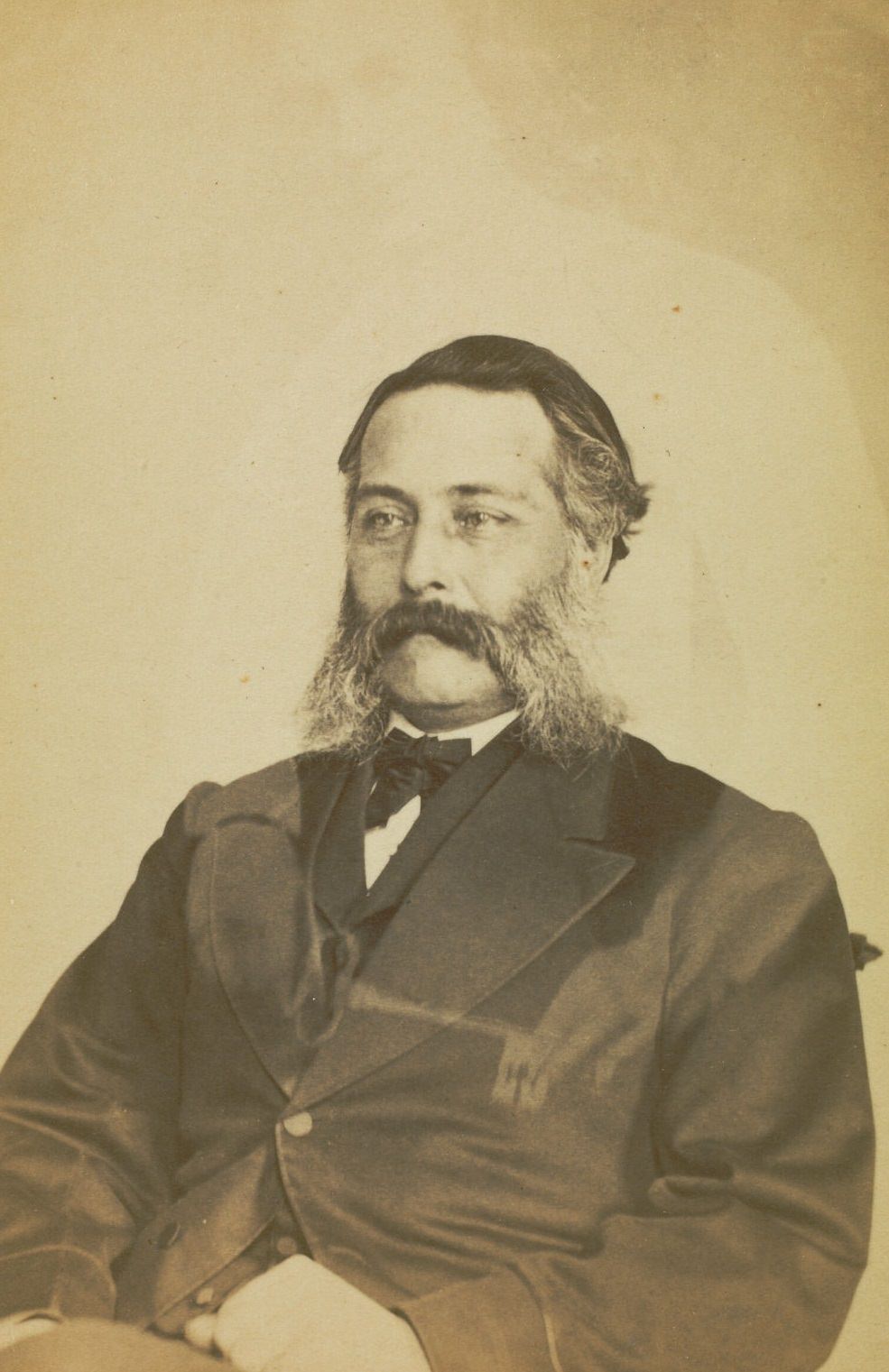 #20 Portrait of L.A. Bigelow with mutton chop whiskers, with the faint image of a woman visible behind him.