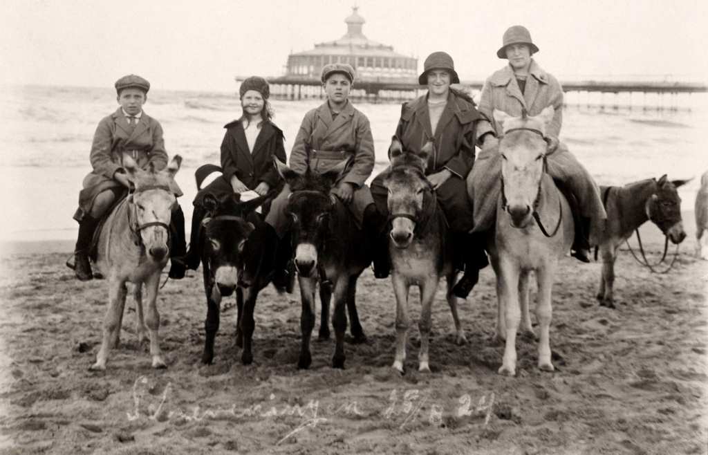 #31 Donkey rides at the seaside, with the pier behind, in Scheveningen near The Hague in the Netherlands, 1924.