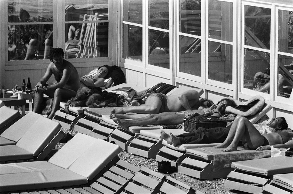 #50 Sunbathing people on beach, April 20, 1975.