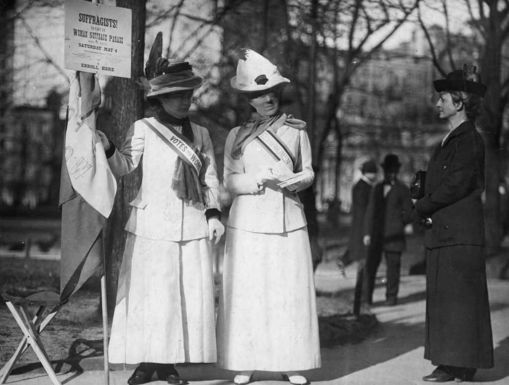 #11 Mrs John Rogers and Mrs Leonard Hand (right) enroll new recruits for a Woman Suffrage Parade, 1913
