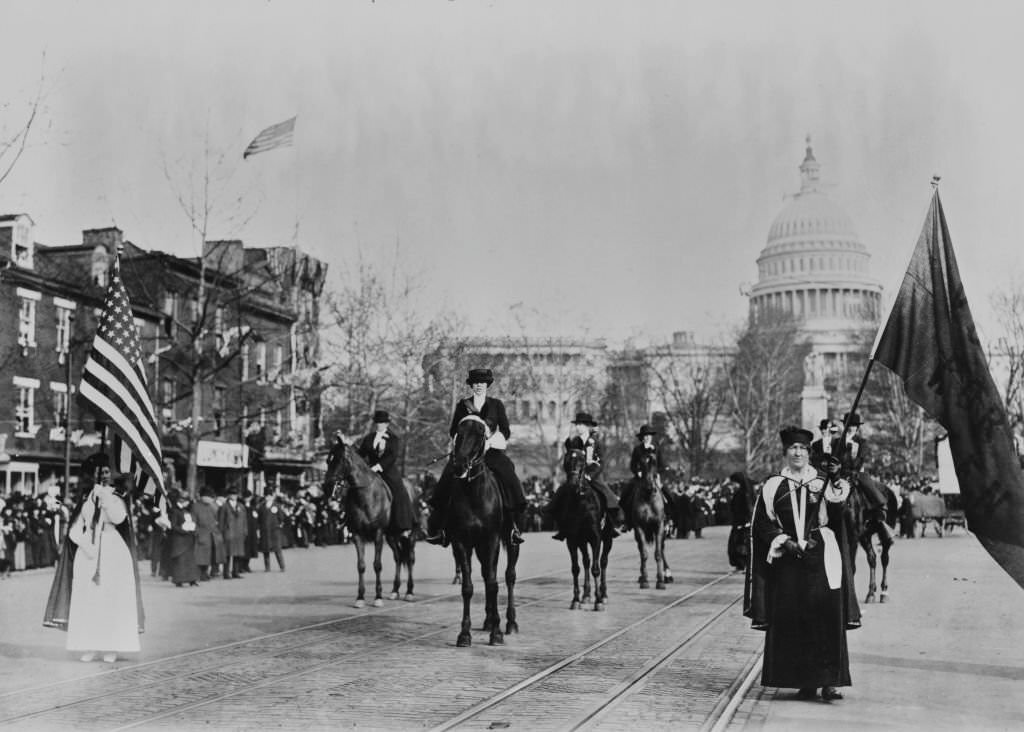 #17 Texan suffragette Jane Walker Burleson (1888 – 1957), Grand Marshal of the parade, on horseback leading suffrage march on Pennsylvania Avenue, Washington DC, US, 3rd March 1913.