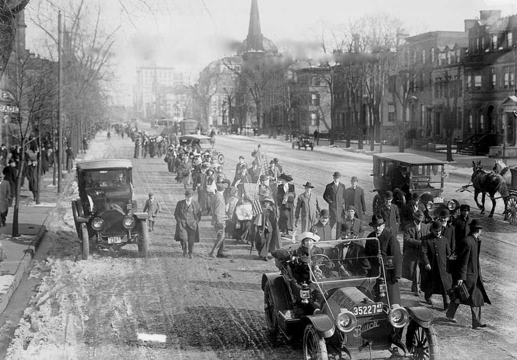 #23 American suffragist Rosalie Jones (1883 – 1978) leads a march along Broad Street, Newark, New Jersey, February 12, 1913.