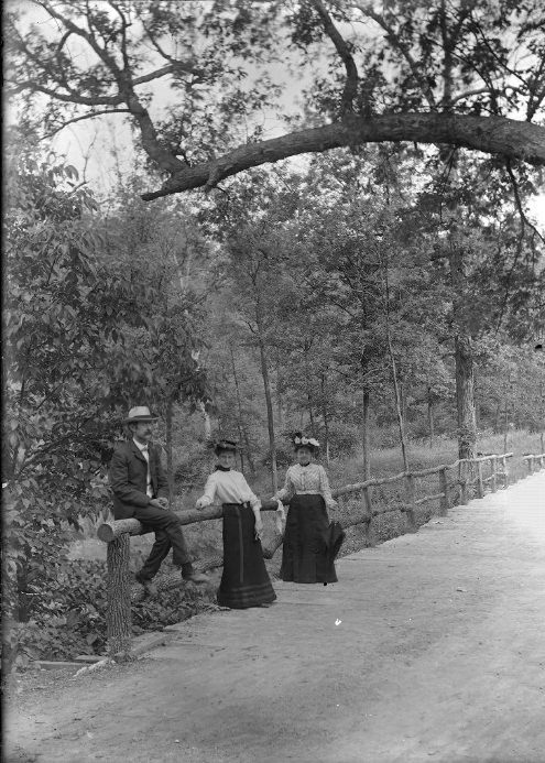 #200 Three People Leaning on a Wooden Railing, 1901