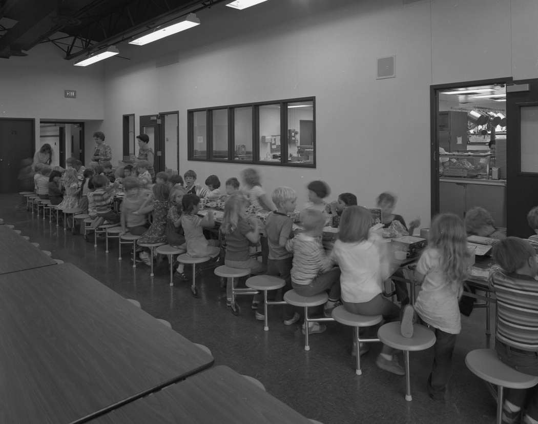 #5 A group of school children eating lunch in the Pflugerville Elementary School cafeteria, 1978